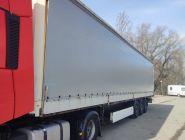 Полуприцеп шторно-бортовой Krone SDP27 0