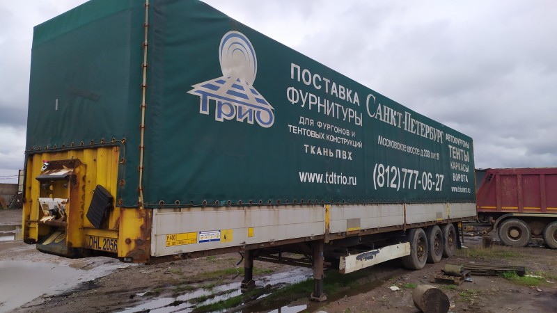 Полуприцеп бортовой-тентованый  Krone SDP27