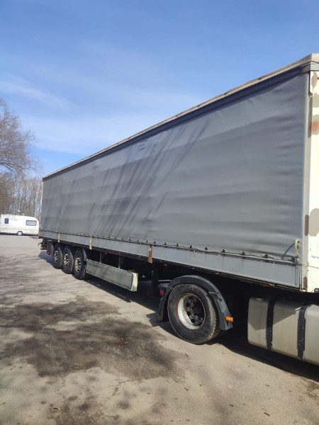 Полуприцеп шторно-бортовой Krone SDP27